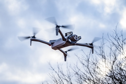 A Small Unmanned Aircraft Systems vehicle assigned to the 87th Civil Engineer Group, hovers midair at Joint Base-McGuire-Dix-Lakehurst, N.J., Nov. 20, 2024. The sUAS program at JB MDL is designed to equip every Airman with basic drone operational training, fostering a deeper understanding of the technology and its potential impact on modern warfare. (U.S. Air Force photo by Senior Airman Matt Porter)