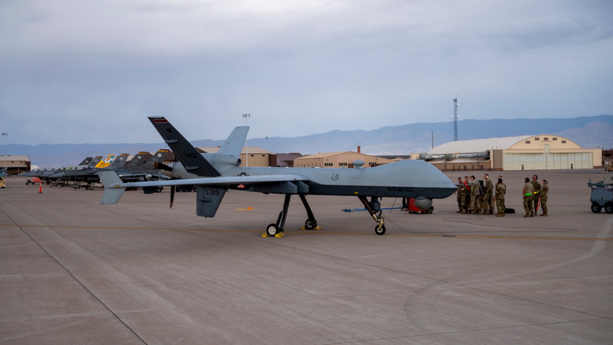 Airmen of the 49th Logistics Readiness Squadron, the 49th Aircraft Maintenance Squadron and the 849th AMXS prepare F-16 Fighting Falcons and MQ-9 Reapers for take-off at Holloman Air Force Base, New Mexico, April 3, 2025. Project Iron Agility is a dynamic training exercise designed to sharpen Airmen's deployment readiness skills through agile operations featuring F-16s, MQ-9s, and integrated logistics support. (U.S. Air Force photo by Senior Airman Michelle Ferrari)