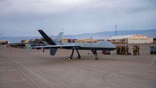 Airmen of the 49th Logistics Readiness Squadron, the 49th Aircraft Maintenance Squadron and the 849th AMXS prepare F-16 Fighting Falcons and MQ-9 Reapers for take-off at Holloman Air Force Base, New Mexico, April 3, 2025. Project Iron Agility is a dynamic training exercise designed to sharpen Airmen's deployment readiness skills through agile operations featuring F-16s, MQ-9s, and integrated logistics support. (U.S. Air Force photo by Senior Airman Michelle Ferrari)