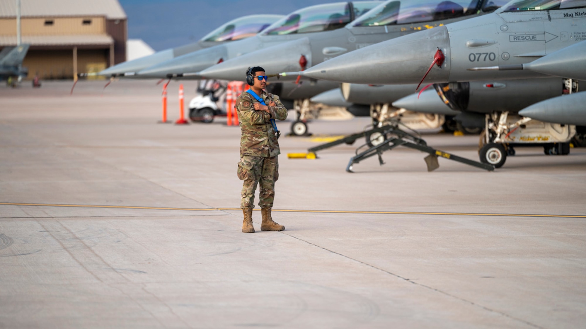 U.S. Air Force Airman 1st Class Alberto Martinez Magana, 349th Aircraft Maintenance Squadron prepares an F-16 Fighting Falcon for take-off at Holloman Air Force Base, New Mexico, April 3, 2025. Project Iron Agility is a dynamic training exercise designed to sharpen Airmen's deployment readiness skills through agile operations featuring F-16s, MQ-9 Reapers, and integrated logistics support. (U.S. Air Force photo by Senior Airman Michelle Ferrari)
