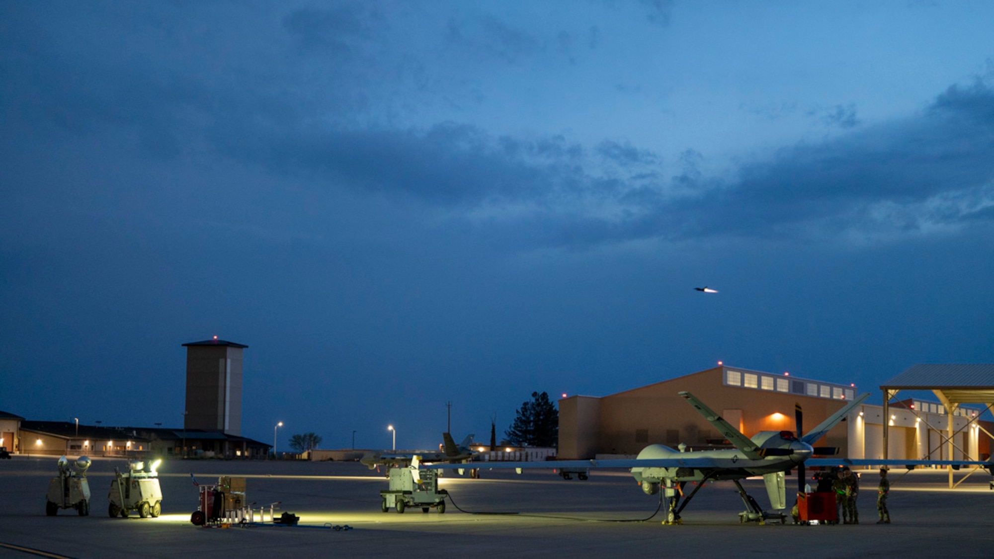 An F-16 Fighting Falcon assigned to Holloman Air Force Base takes off for a nighttime deployment flying operation during Project Iron Agility at Holloman Air Force Base, New Mexico, April 3, 2025. Aligned with the Agile Combat Employment concept, Project Iron Agility trains Airmen to operate under austere and evolving conditions, emphasizing quick decision-making and decentralized command. (U.S. Air Force photo by Senior Airman Michelle Ferrari)