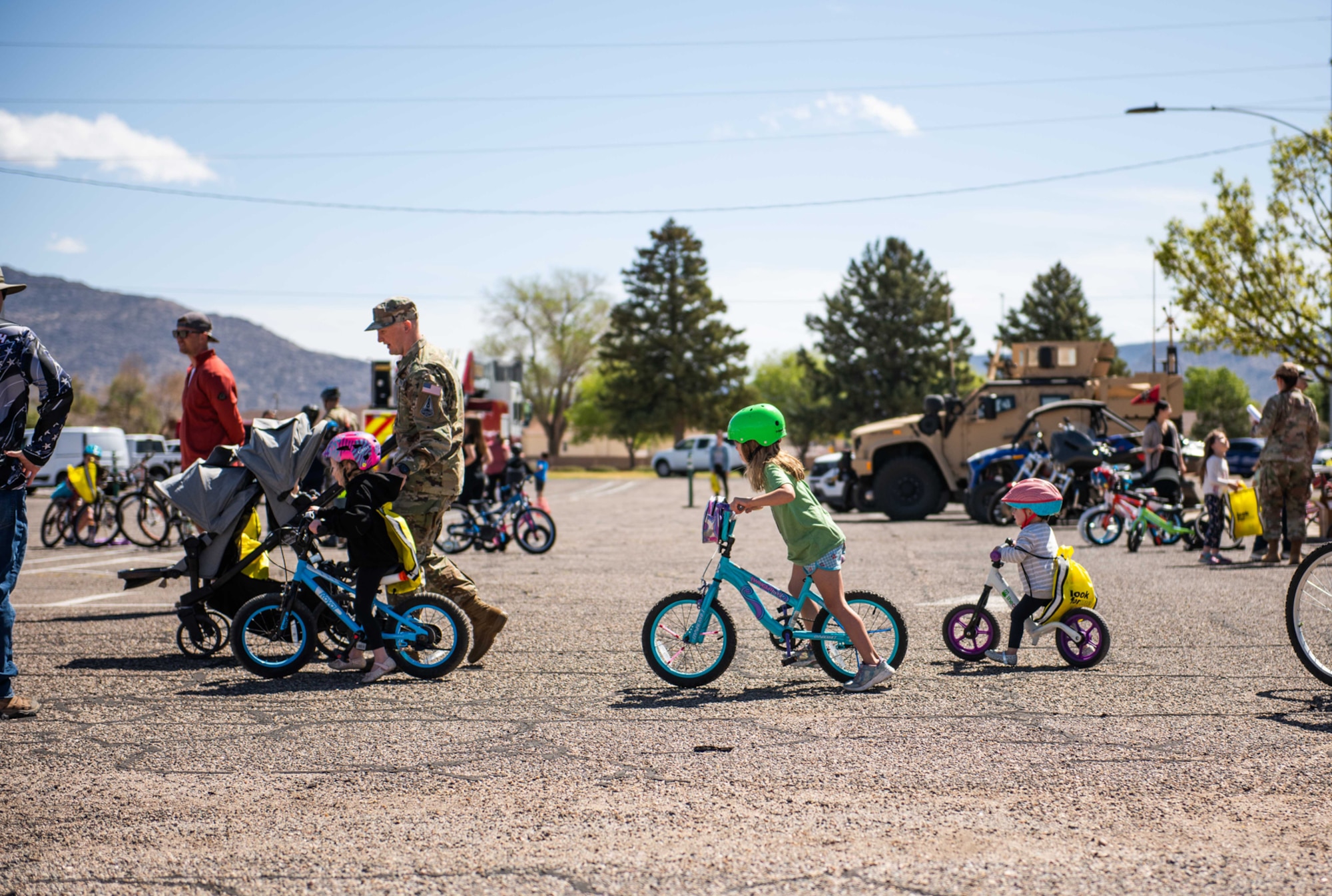 Children on bikes in line
