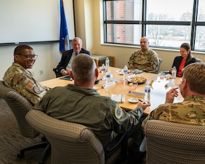 Illinois Sen. Dick Durbin speaks to Gen. Randall Reed, U.S. Transportation Command (USTC) commander, Brig. Gen. Corey Simmons, Air Mobility Command Strategy, Plans, Requirements and Programs director, and Col. Jeffrey Smith, 932nd Airlift Wing commander, during Durbin’s visit to the 932nd AW, Scott AFB, Illinois, April 14, 2025.  During his visit, Durbin was updated on 932nd AW distinguished visitor airlift missions, USTC mission and challenges facing USTRANSCOM and the USTC air component, Air Mobility Command.  (U.S. Air Force photo by Brooke Spenner)