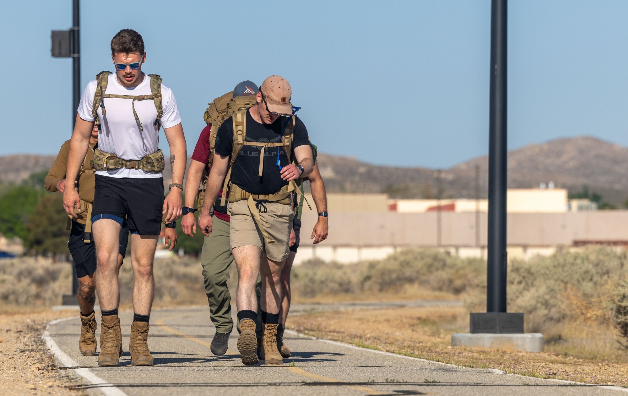 Airmen conduct a ruck march during a commemorative Bataan Death March event on Edwards Air Force Base, California, April 12. (Air Force photo by Jennifer Healy)