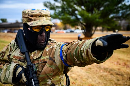 U.S. Air Force Tech. Sgt. John Norris, 108th Operations Group intelligence analyst, signals the reconnaissance scouting of a small unmanned aircraft systems vehicle at Joint Base-McGuire-Dix-Lakehurst, N.J., Nov. 20, 2024. The sUAS program at JB MDL is designed to equip every Airman with basic drone operational training, fostering a deeper understanding of the technology and its potential impact on modern warfare. (U.S. Air Force photo by Senior Airman Matt Porter)