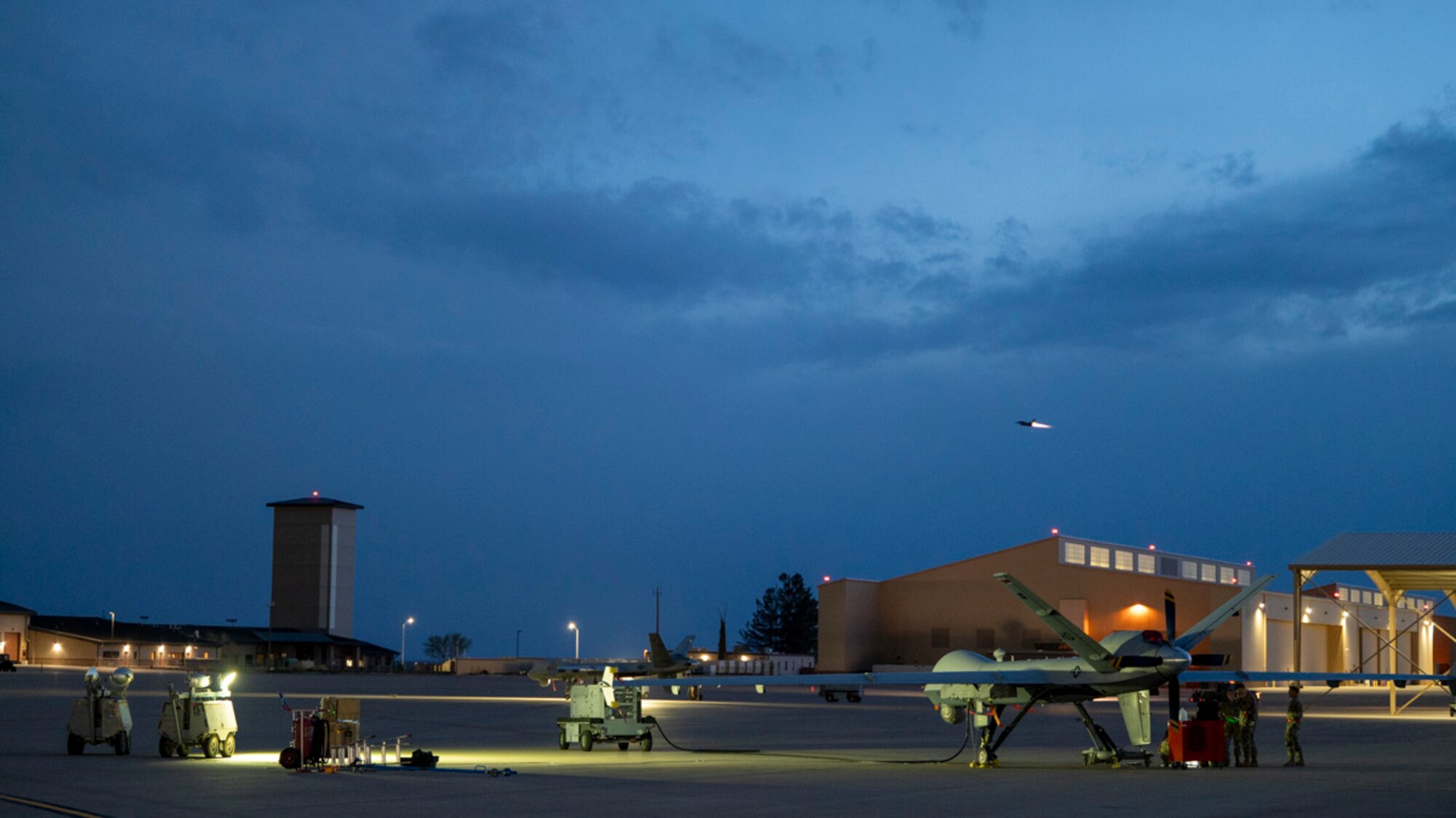 An F-16 Fighting Falcon assigned to Holloman Air Force Base takes off for a nighttime deployment flying operation during Project Iron Agility at Holloman Air Force Base, New Mexico, April 3, 2025. Aligned with the Agile Combat Employment concept, Project Iron Agility trains Airmen to operate under austere and evolving conditions, emphasizing quick decision-making and decentralized command. (U.S. Air Force photo by Senior Airman Michelle Ferrari)
