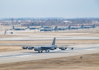A U.S. Air Force B-52H Stratofortress assigned to the 96th Bomb Squadron, Barksdale Air Force Base, Louisiana, lands on the runway for Exercise Prairie Vigilance 25-1 at Minot Air Force Base, North Dakota, April 9, 2025. As a routine training mission, Prairie Vigilance enhances the safety, security and reliability of the bomber leg of the U.S. nuclear triad. (U.S. Air Force photo by Senior Airman Kyle Wilson)
