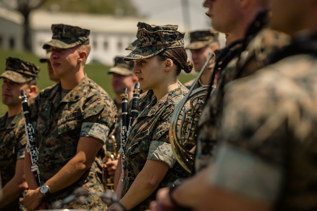 U.S. Marines assigned to Quantico Marine Corps Band perform at Butler Stadium on MCB Quantico, April 18, 2025. The band provides musical support that encourages community relations, enhances troop morale, and promotes the Marine Corps. (U.S. Marine Corps photo by Lance Cpl. Harleigh Faulk)
