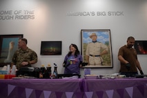 U.S. Air Force Col. James Schlabach, 91st Missile Wing (MW) commander (left), his wife Monica Schlabach (center) and Detrick Thomas, spouse of Chief Master Sgt. Becky Thomas, 91 MW Command Chief Master Sergeant (right), prepare breakfast for military children at Minot Air Force Base, North Dakota, April 18, 2025. The breakfast allowed children and families to celebrate the Month of the Military Child together. (U.S. Air Force photo by Senior Airman Alyssa Bankston)