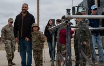 Team Minot families tour the Training Launch Facility (LF) U-01 at Minot Air Force Base, North Dakota, April 18, 2025. LF U-01 is used for training by maintainers, defenders and the tactical response force. (U.S. Air Force photo by Senior Airman Alyssa Bankston)