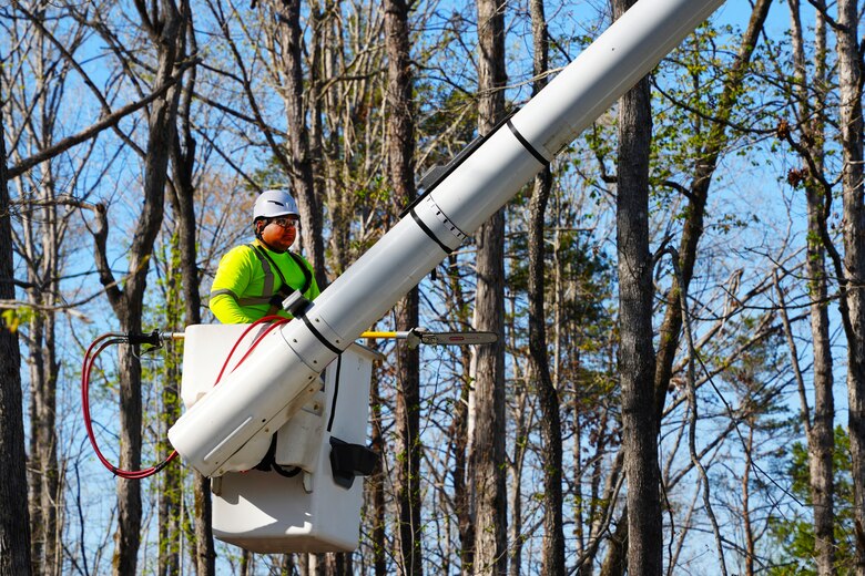 Contractors working under the direction of the U.S. Army Corps of Engineers clear storm debris from Hurricane Helene at the Boy Scouts of America's Camp Grimes in McDowell County, North Carolina, April 18, 2025. The removal effort is part of a FEMA-assigned mission to assist with private property debris removal. The work is helping prepare the 1,100-acre Boy Scout camp to reopen for summer programs.