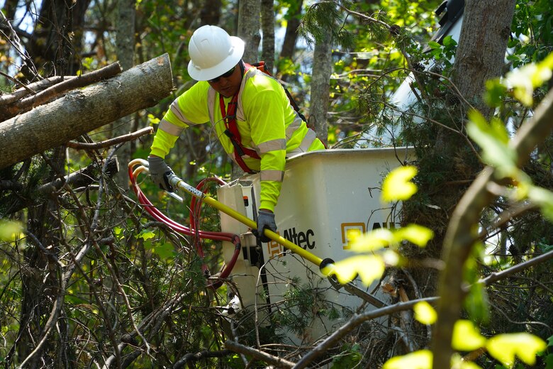 Contractors working under the direction of the U.S. Army Corps of Engineers clear storm debris from Hurricane Helene at the Boy Scouts of America's Camp Grimes in McDowell County, North Carolina, April 18, 2025. The removal effort is part of a FEMA-assigned mission to assist with private property debris removal. The work is helping prepare the 1,100-acre Boy Scout camp to reopen for summer programs.