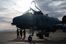 A U.S. Air Force A-10C Thunderbolt II assigned to the 757th Aircraft Maintenance Squadron, sits on the flight line as weapons crew members prepare for the first quarter weapons standardization load crew competition at Nellis Air Force Base, Nevada, April 18, 2025.
