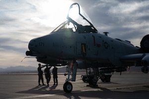 A U.S. Air Force A-10C Thunderbolt II assigned to the 757th Aircraft Maintenance Squadron, sits on the flight line as weapons crew members prepare for the first quarter weapons standardization load crew competition at Nellis Air Force Base, Nevada, April 18, 2025.