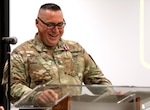Sgt. 1st Class Britt Talley shares a smile while addressing attendees during his retirement ceremony April 18 at Camp Lincoln in Springfield, Illinois. Talley expressed gratitude to his family, mentors, and fellow Soldiers as he closed out 31 years of service in the Illinois Army National Guard.
(U.S. Army photo by 2nd Lt. Trenton Fouche, Joint Force Headquarters – Illinois National Guard)