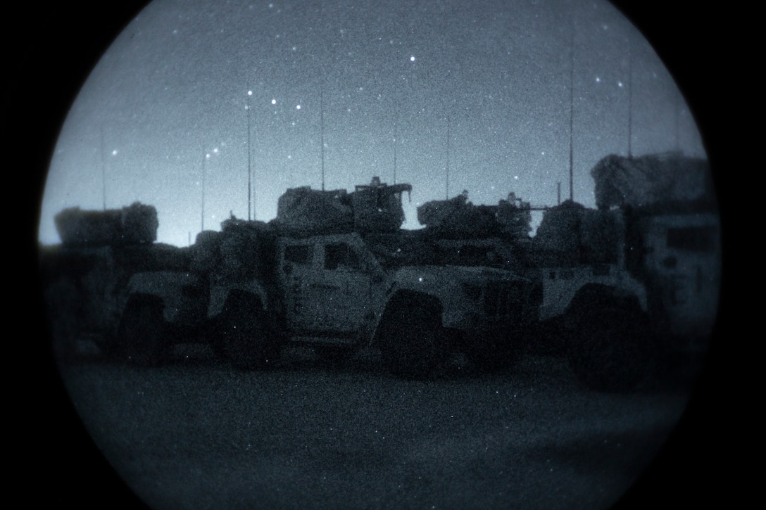 U.S. Marine Corps Joint Light Tactical Vehicles are staged during Marine Air-Ground Task Force Warfighting Exercise 1-25, as part of Service Level Training Exercise 1-25 at Marine Corps Air-Ground Combat Center, Twentynine Palms, California, Feb. 21, 2025. MWX is a comprehensive training event designed to enhance the operational readiness and combat effectiveness of all MAGTF elements by simulating complex and dynamic battle scenarios while refining tactics and coordination to ensure we are prepared to dominate any adversary in a contested environment. (U.S. Marine Corps photo by Lance Cpl. Enge You)
