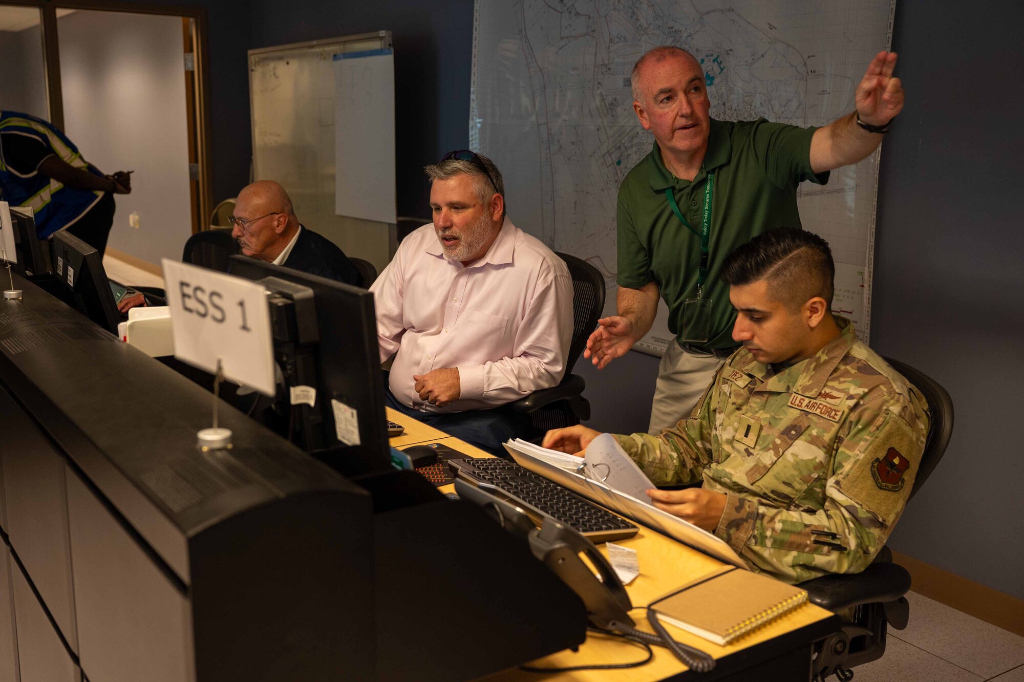 From left, Wayne McGuffin, 42nd Civil Engineer Squadron emergency manager, Shane Downum, 42nd Mission Support Group deputy director and Emergency Operations Center director, Michael Weiler, 42nd CES assistant emergency manager, and 1st Lt. Justin Lopez, 42nd MSG executive officer, run through checks during an active shooter exercise at Maxwell Air Force Base, Alabama, April 15, 2025