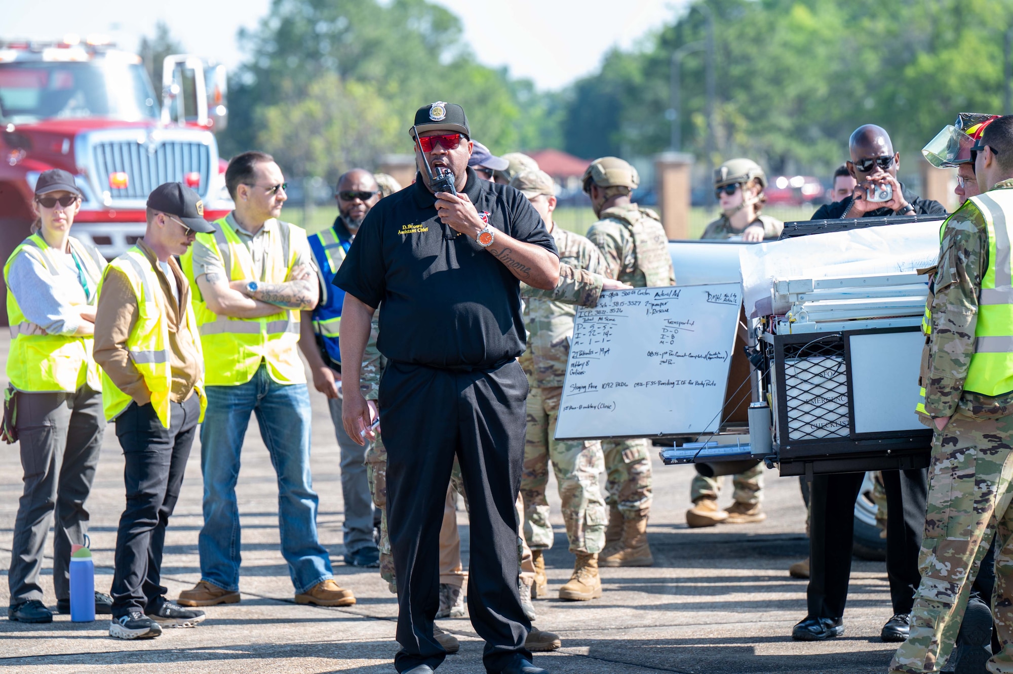 Defonzo Brown, 42nd Civil Engineer Squadron assistant fire chief and MAXFORCE exercise operations chief, makes a radio call during a Max Force exercise at Maxwell Air Force Base, Alabama, April 17, 2025.