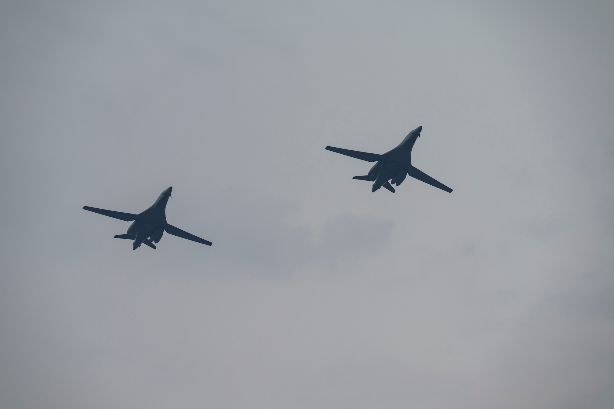 B-1B Lancers assigned to Dyess Air Force Base, Texas, fly over Misawa Air Base, Japan, in support of Bomber Task Force 25-2, April 18, 2025. USSTRATCOM Bomber Task Force missions help maintain global stability and security by demonstrating the ability to operate in different environments and locations while building Ally and partner military capabilities. (U.S. Air Force photo by Senior Airman Emma Anderson)