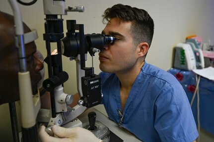 U.S. Army Maj. Halward Blegen, Brooke Army Medical Center refractive eye surgeon, assesses a patient at Georgetown Public Hospital, Georgetown, Guyana, April 3, 2025 during the Lesser Antilles Medical Assistance Team (LAMAT) 2025.