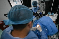 U.S. Army Maj. Sien Chen, Brooke Army Medical Center cataract eye surgeon, performs a procedure on a Guyanese patient at Georgetown Public Hospital, Guyana, April 3, 2025 during the Lesser Antilles Medical Assistance Team (LAMAT) 2025 mission.
