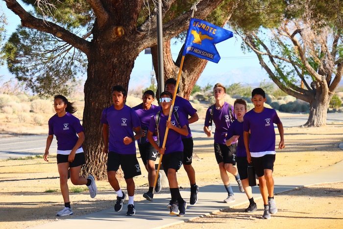 The Edwards Air Force Base JROTC unit at Desert Junior-Senior High School honored service members who defended the Philippines during World War II by marching in remembrance of the Bataan Death March.