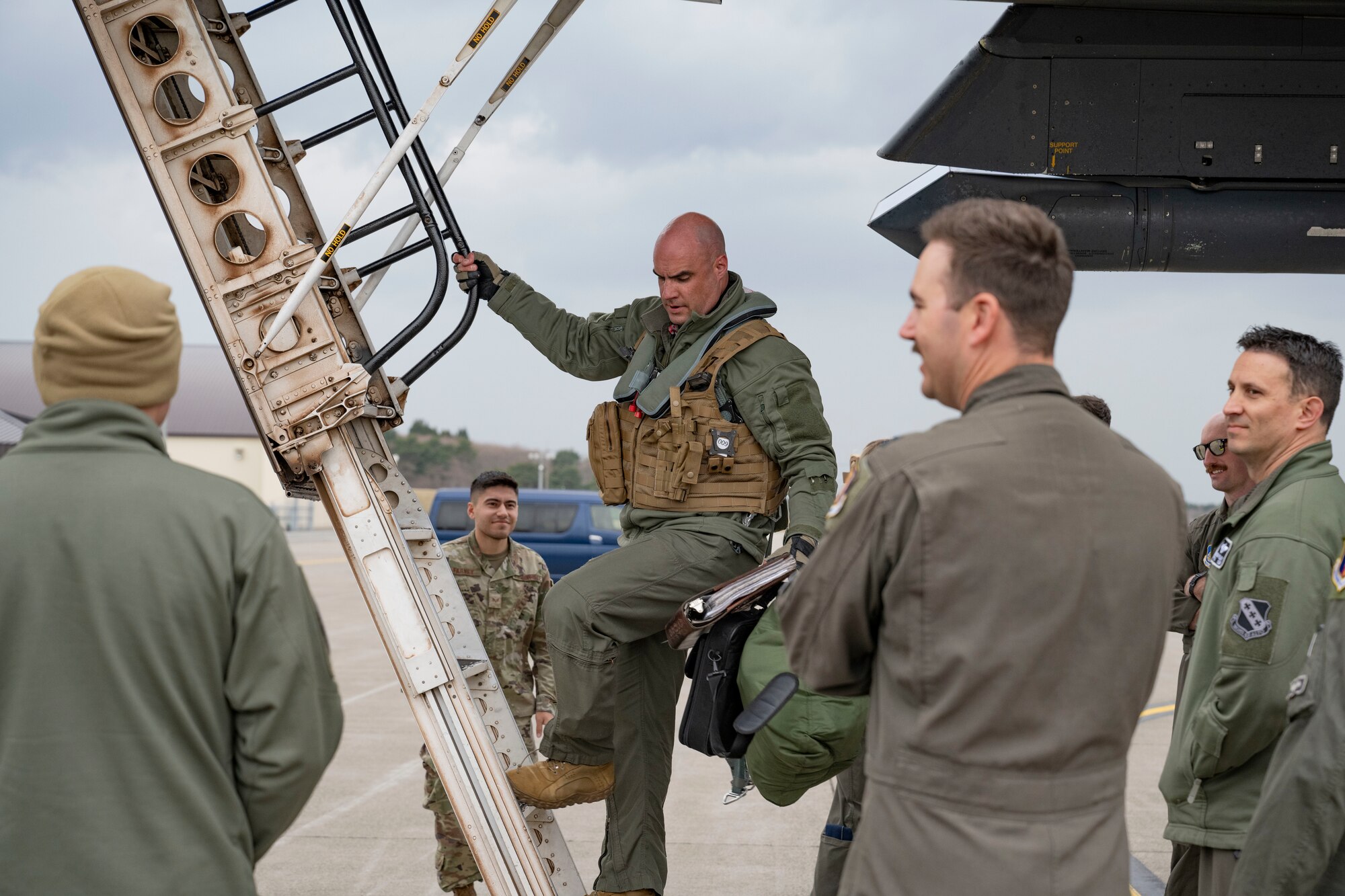 U.S. Air Force Lt. Col. Ryan Stillwell, 9th Expeditionary Bomb Squadron commander exits a B-1B Lancer at Misawa Air Base, Japan, during Bomber Task Force 25-2, April 18, 2025. U.S. Air Force Bomber Task Forces regularly conduct combined theater security cooperation engagements with Allies and partners, demonstrating the U.S. capability to command, control and conduct strategic assets across the globe. (U.S. Air Force photo by Senior Airman Emma Anderson)