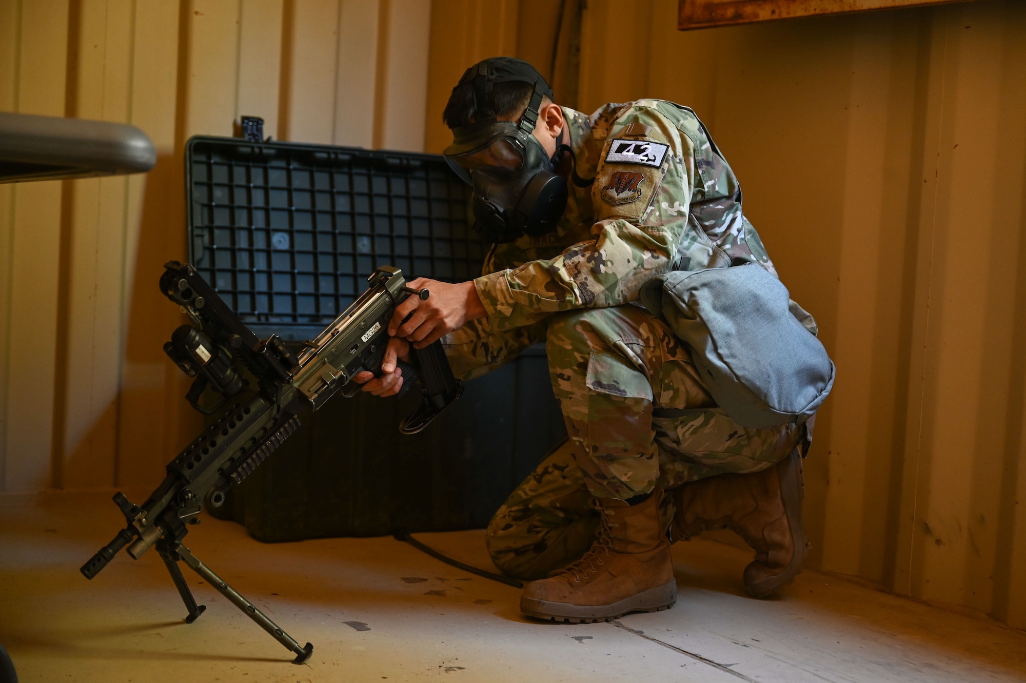 Airman assembles a weapon.