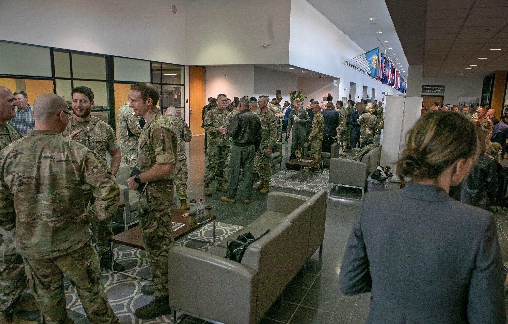 group of people in a hall;