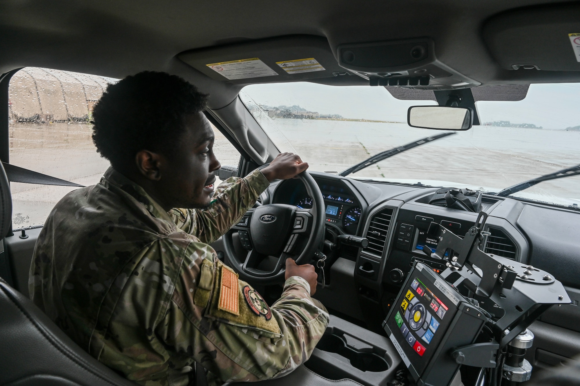 Senior Airman Morisse Daniels, 8th Operations Support Squadron airfield management operations supervisor, evaluates runway conditions during Freedom Flag 25-1 at Kunsan Air Base, Republic of Korea, April 22, 2025.
