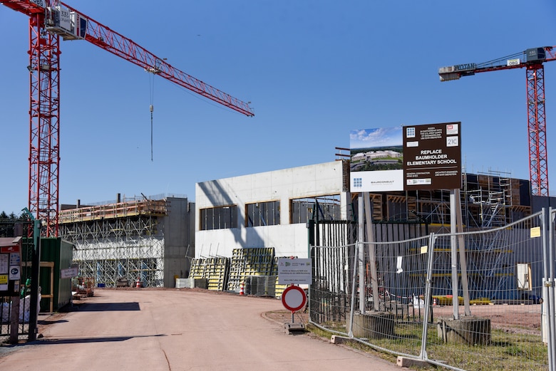construction cranes over school construction zone