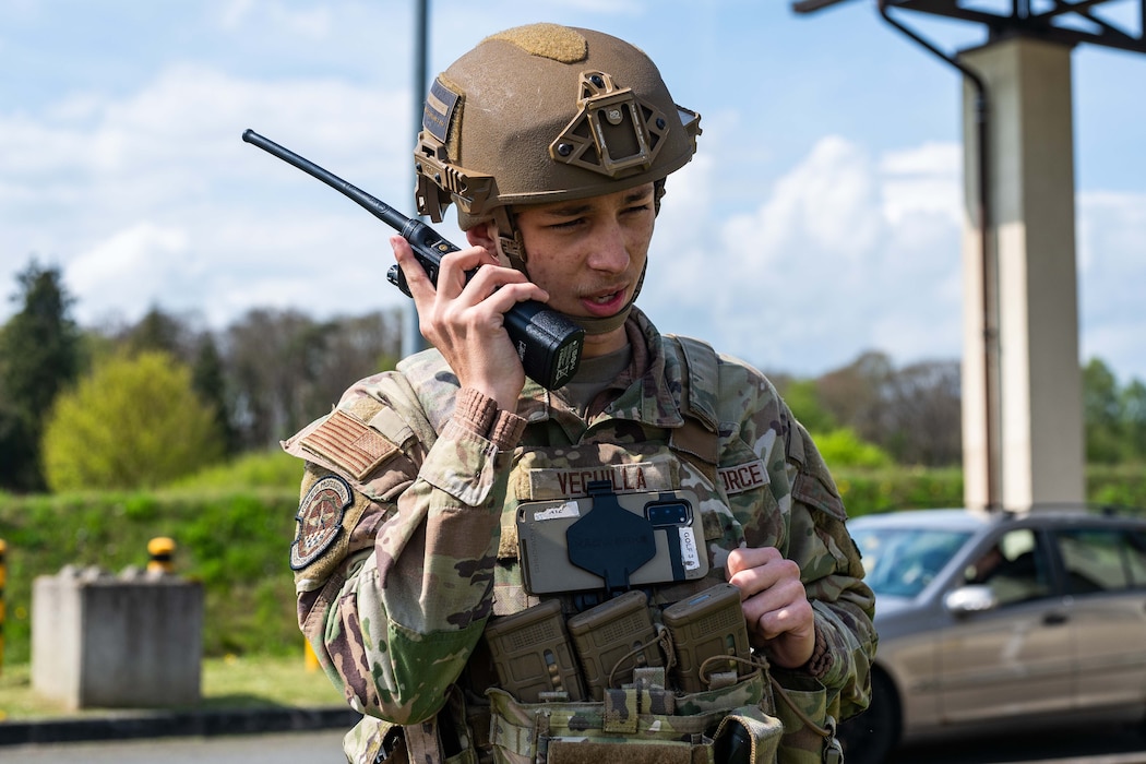 U.S. Air Force Airman 1st Class Caden Veguilla, 52nd Security Forces Squadron defender, responds to a simulated threat during Exercise Swift Saber 25 at Spangdahlem Air Base, Germany, April 22, 2025. The scenario validated the defenders’ ability to respond to a simulated threat and secure an entry control point for the installation. Exercises like Swift Saber 25 strengthen the 52nd Fighter Wing’s warfighting capabilities by validating Agile Combat Employment concepts such as rapid threat response, dispersed operations and mission generation in contested environments. (U.S. Air Force photo by Staff Sgt. Max J. Daigle)