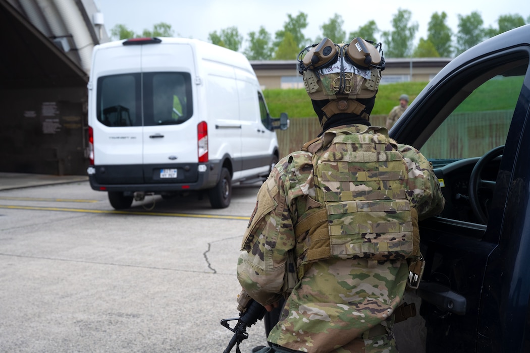 U.S. Air Force Senior Airman Daniel Baik, a 52nd Security Forces Squadron defender, responds to the scene of a simulated insider attack on an F-16 Fighting Falcon during Exercise Swift Saber 25 at Spangdahlem Air Base, Germany, April 22, 2025. Defenders were challenged to identify, respond to and neutralize simulated threats and other attacks throughout the combat readiness exercise. Swift Saber 25 enhances the 52nd Fighter Wing’s warfighting capabilities by validating Agile Combat Employment concepts such as rapid threat response, dispersed operations and mission generation in contested environments. (U.S. Air Force photo by Senior Airman Darius Frazier)