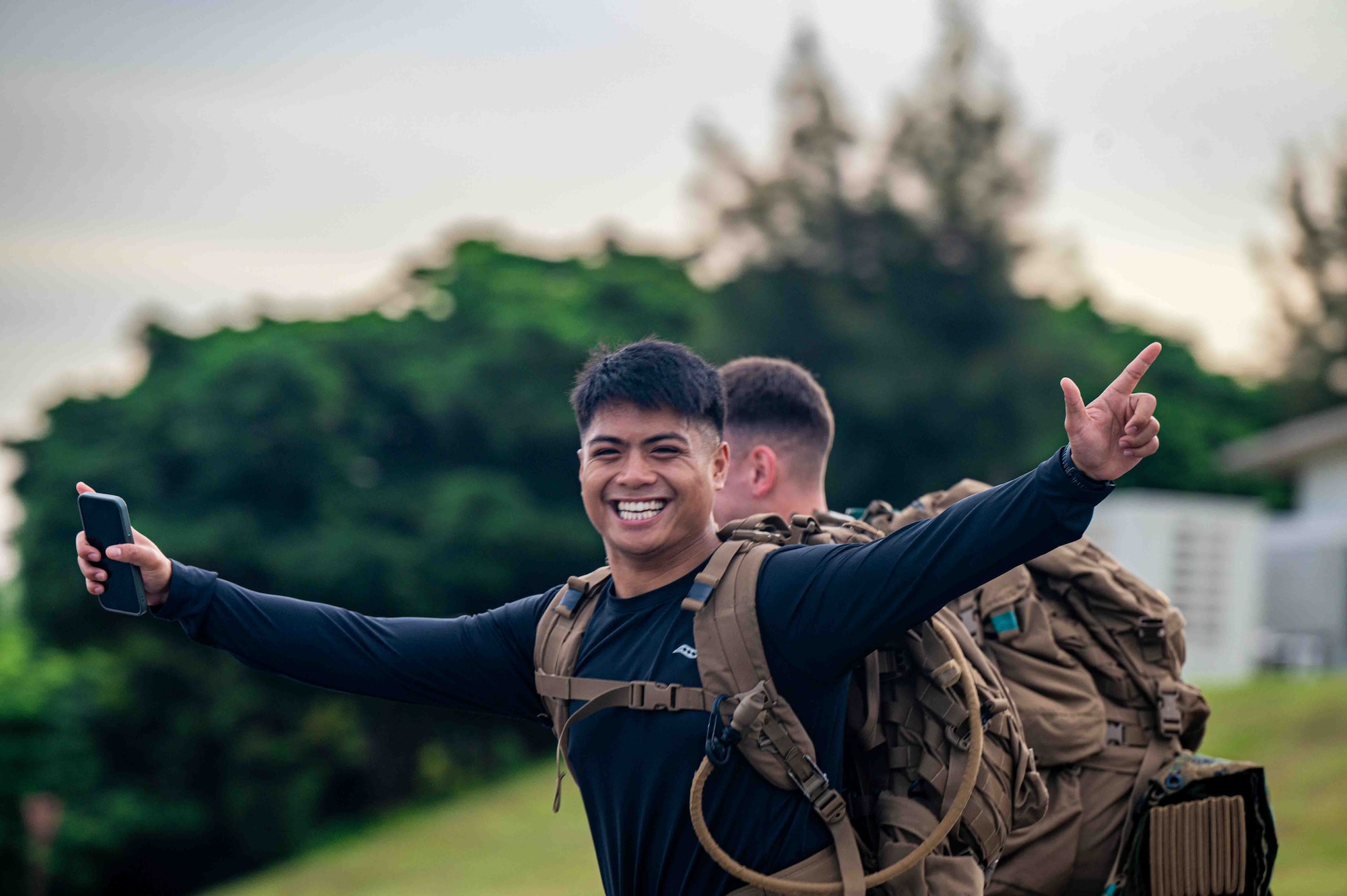 Service members pose for a photo during the run in the Bataan March.