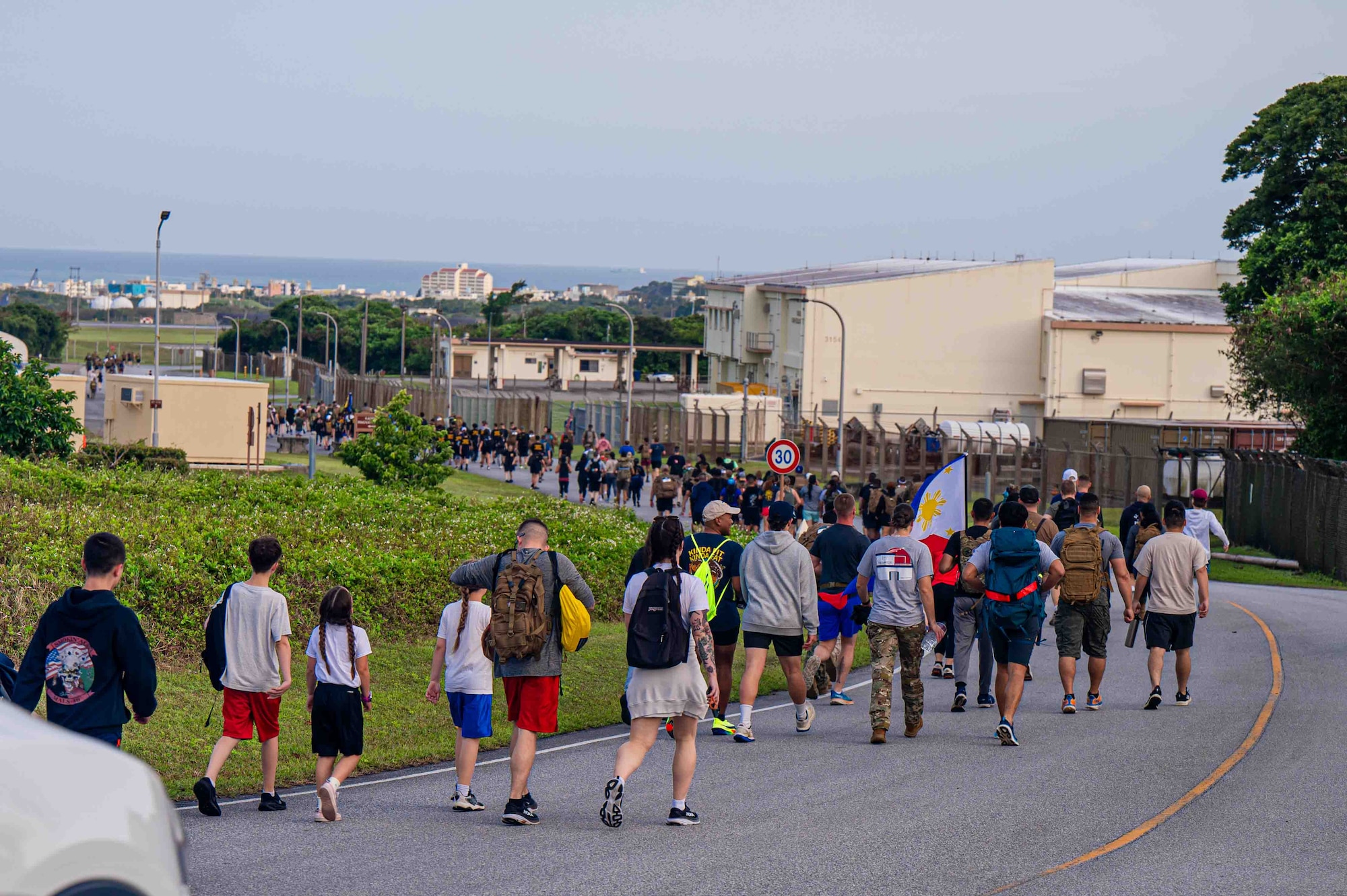 Service members run in the Bataan March.