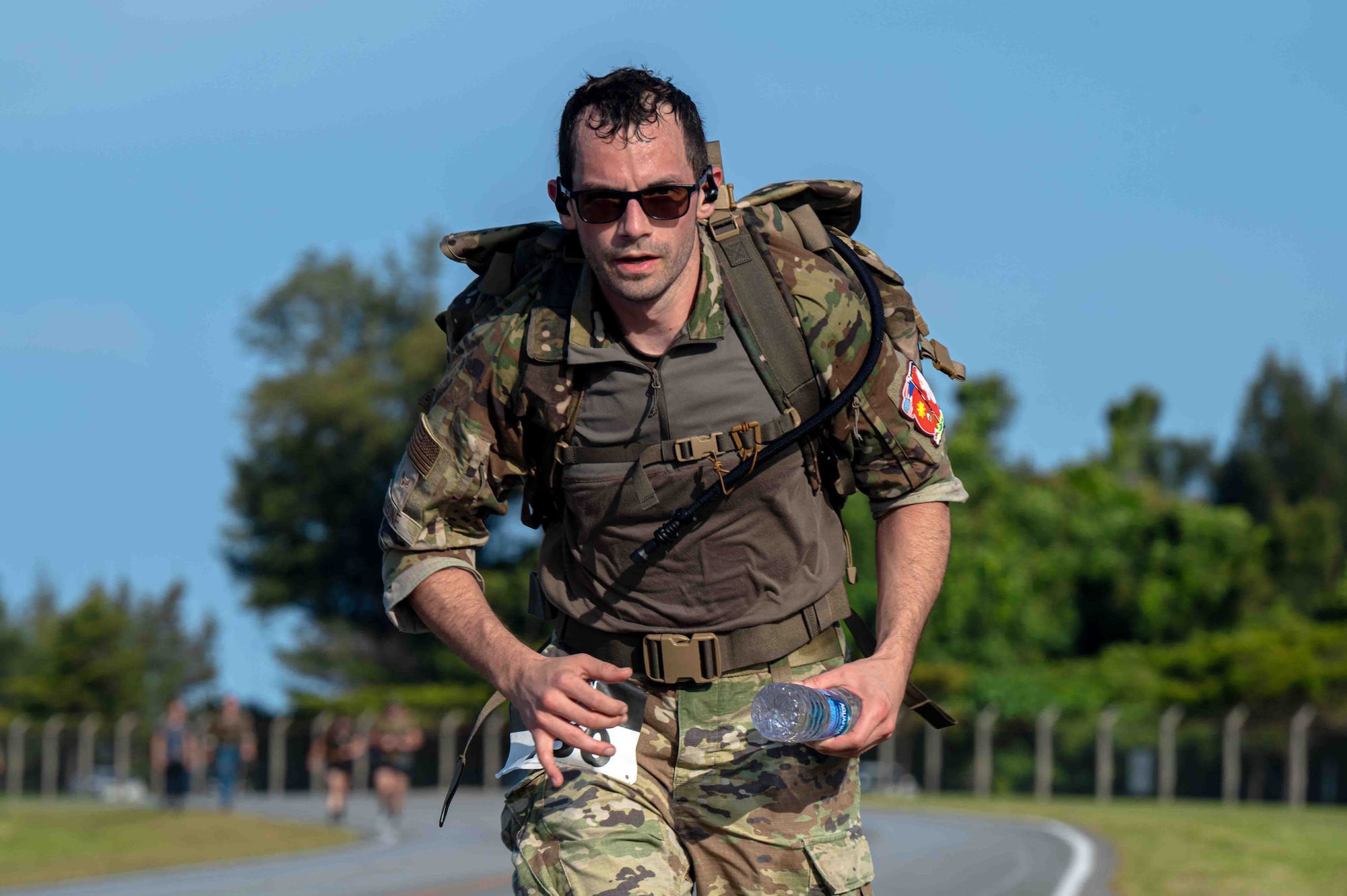 Service member runs in the Bataan March.
