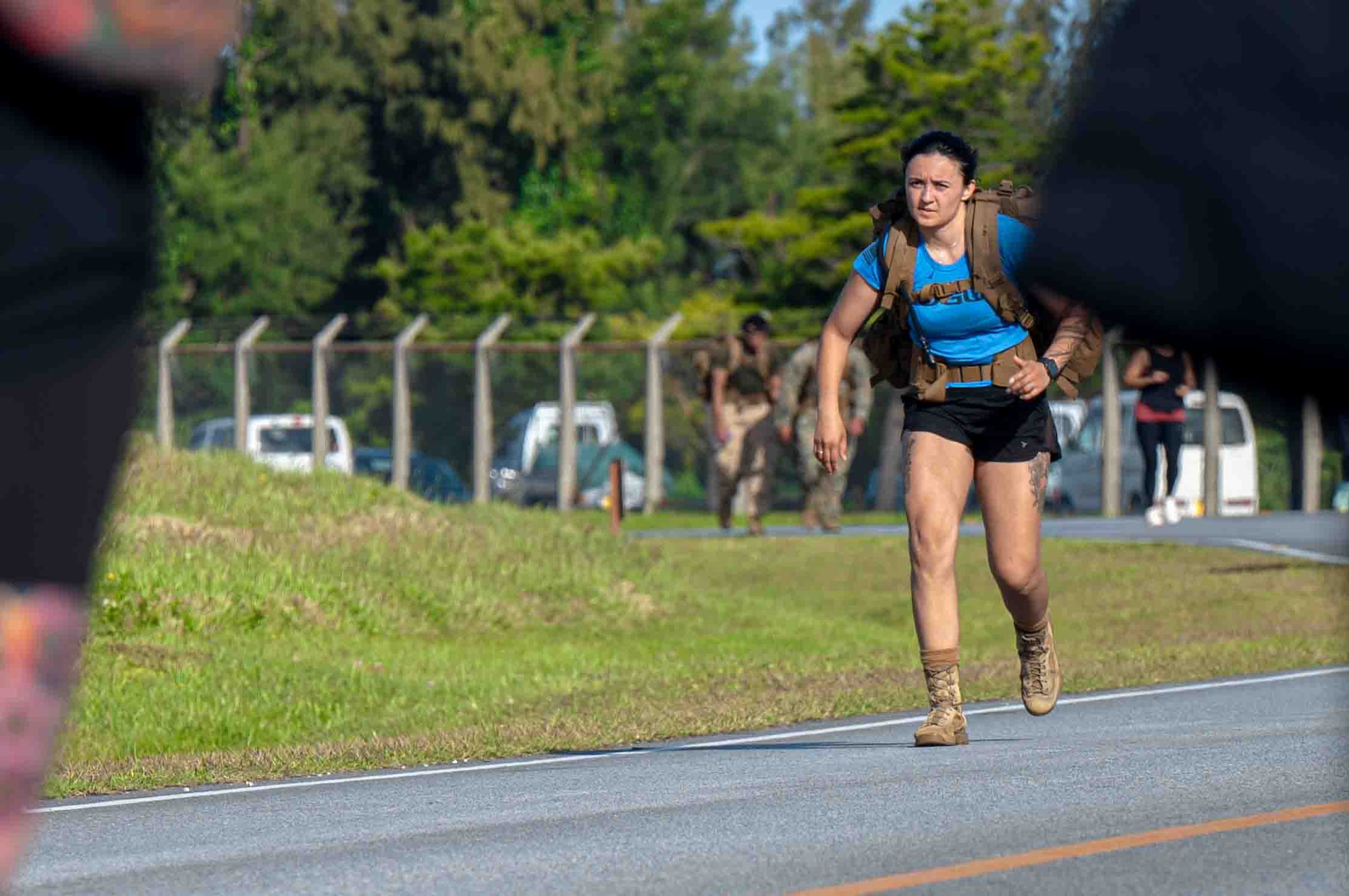 Service member runs in the Bataan March.