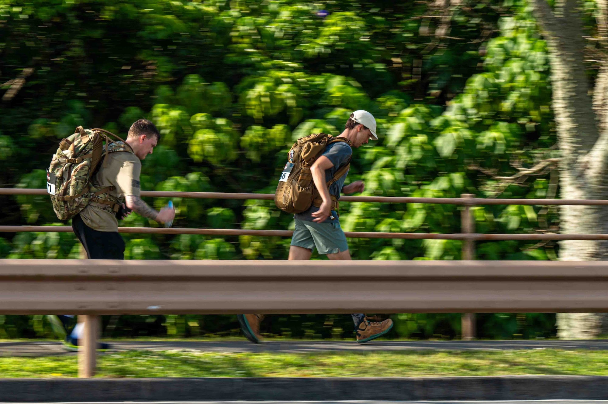 A service member is running for the Bataan march