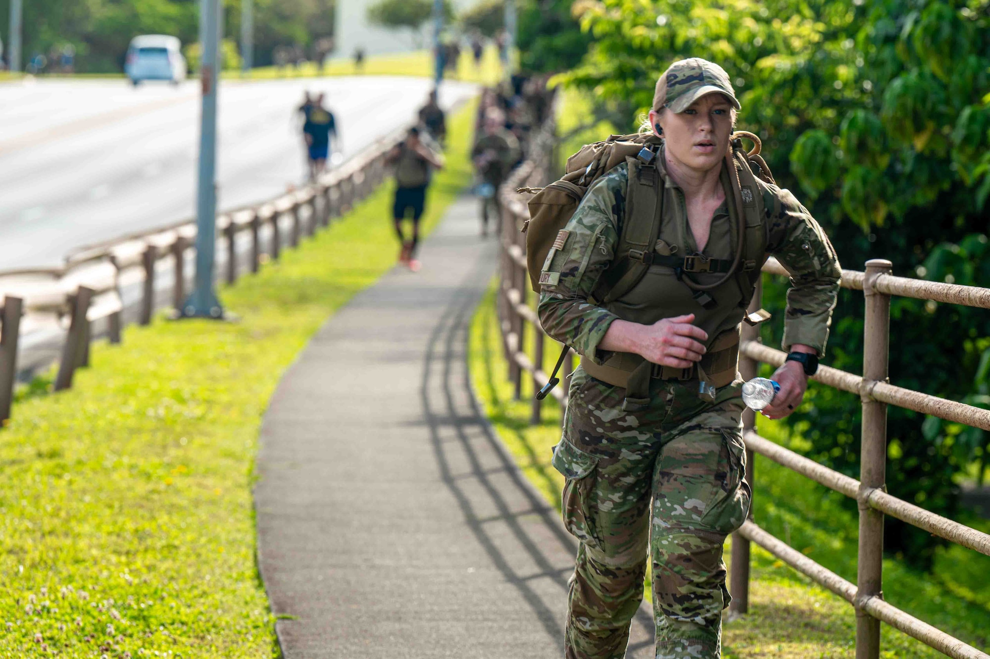 A service member is running for the Bataan march.