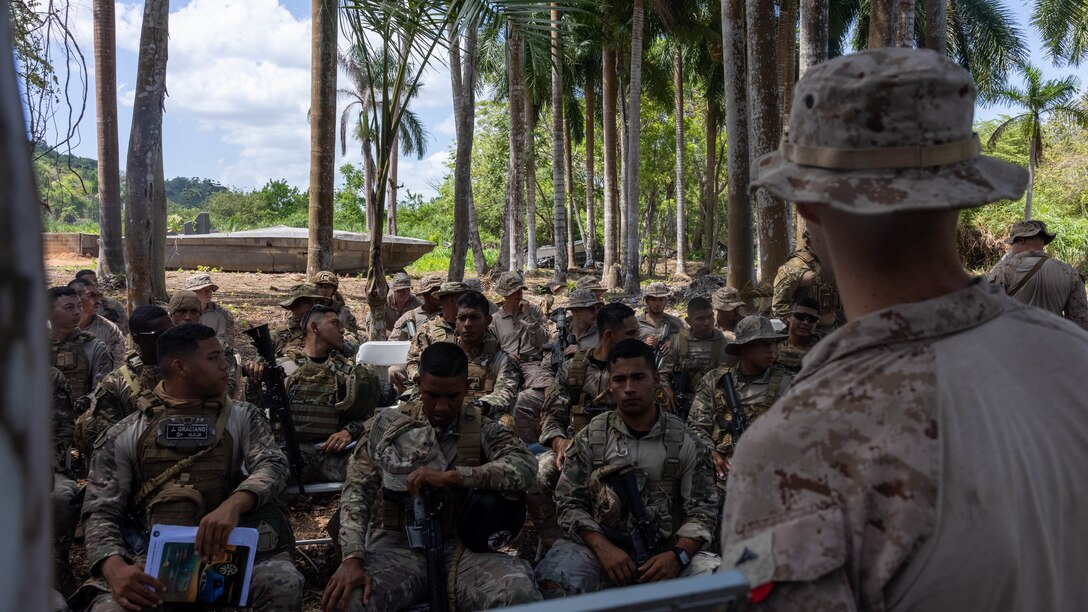 Panamanian security forces are taught a class on movement formations by U.S. Marines with 1st Battalion, 8th Marines, 6th Regiment, 2d Marine Division in Rodman, Panama, April 16, 2025. U.S. Southern Command is focused on increasing partner nation capacity and interoperability in the region and reflects the United States’ enduring promise of friendship, partnership, and solidarity with the Panamanian people. (U.S. Marine Corps photo by Lance Cpl. Francis Hrosar)