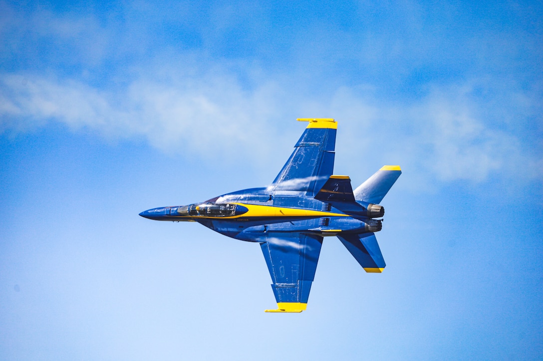The U.S. Navy Flight Demonstration Team, the Blue Angels, perform aerobatic maneuvers for spectators at the 2025 Beaufort Airshow at Marine Corps Air Station Beaufort, South Carolina, April 13, 2025. The mission of the Blue Angels is to showcase the pride and professionalism of the United States Navy and Marine Corps by inspiring a culture of excellence and service to the country through flight demonstrations and community outreach. (U.S. Marine Corps photo by Cpl. Mason Coots)