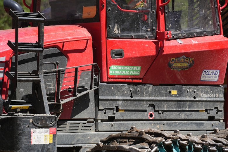 A “biodegradable hydraulic fluid” sticker is visible on a debris removal vehicle operated by a U.S. Army Corps of Engineers contractor along the Toe River in western North Carolina, April 15, 2025. The environmentally friendly fluid helps ensure that any potential hydraulic leaks do not harm the surrounding area as Hurricane Helene debris cleanup continues across the region.