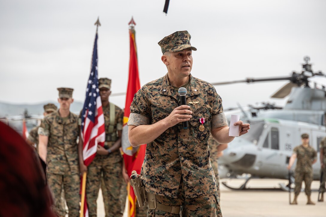 U.S. Marine Corps Lt. Col. Mark R. Mauberret, the outgoing commanding officer of Marine Light Helicopter Attack Squadron 775, Marine Aircraft Group 41, 4th Marine Aircraft Wing, delivers remarks during a change of command ceremony at Marine Corps Air Station Camp Pendleton, Calif., April 13, 2025. During the ceremony, Lt. Col. Mark R. Mauberret relinquished command of HMLA-775 to Lt. Col. Jack R. Guevara. The ceremony represents the transfer of authority, responsibility, and accountability from the outgoing officer to the incoming commanding officer. (U.S. Marine Corps photo by Lance Cpl. Mhecaela J. Watts)