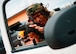 A 91st Missile Security Operations Squadron defender conducts vehicle egress training at Camp Guernsey Joint Training Center’s North Training Area, Wyoming, April 8, 2025. The drill simulates a hostile engagement scenario requiring defenders to rapidly exit their vehicle, establish security, and engage potential threats while coordinating with convoy elements. (U.S. Air Force photo by Staff Sgt. Michael A. Richmond)