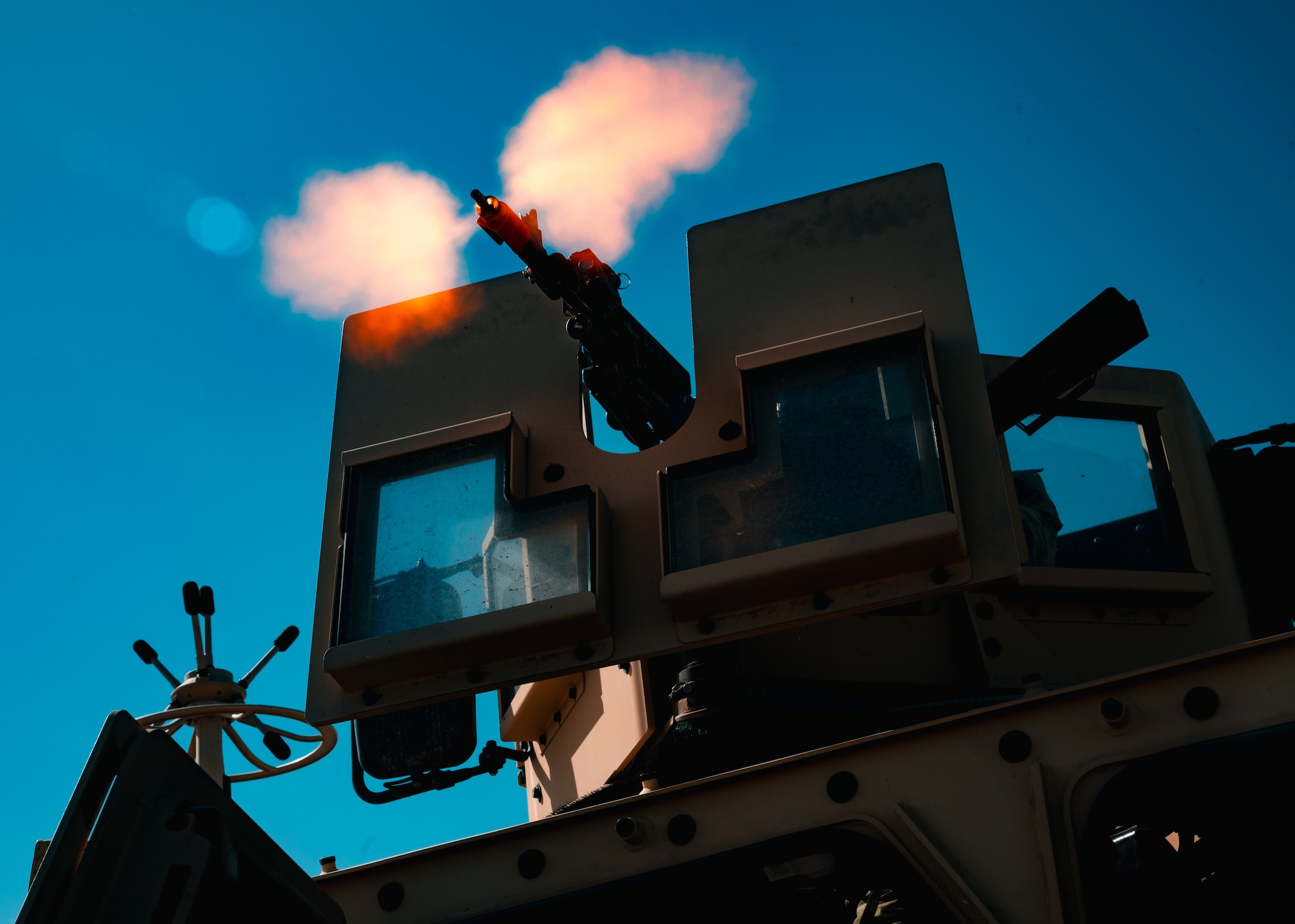 Airman 1st Class Caleb Gomez, 91st Missile Security Operations Squadron Convoy Response Force defender, conducts a weapon check before participating in the Nuclear Convoy Course at Camp Guernsey Joint Training Center’s South Training Area, Wyoming, April 9, 2025. During the course, Airmen from across 20th Air Force trained on counter-small unmanned aircraft systems, mounted operations, heavy weapons, and helicopter integration to strengthen convoy defense. (U.S. Air Force photo by Staff Sgt. Michael A. Richmond)