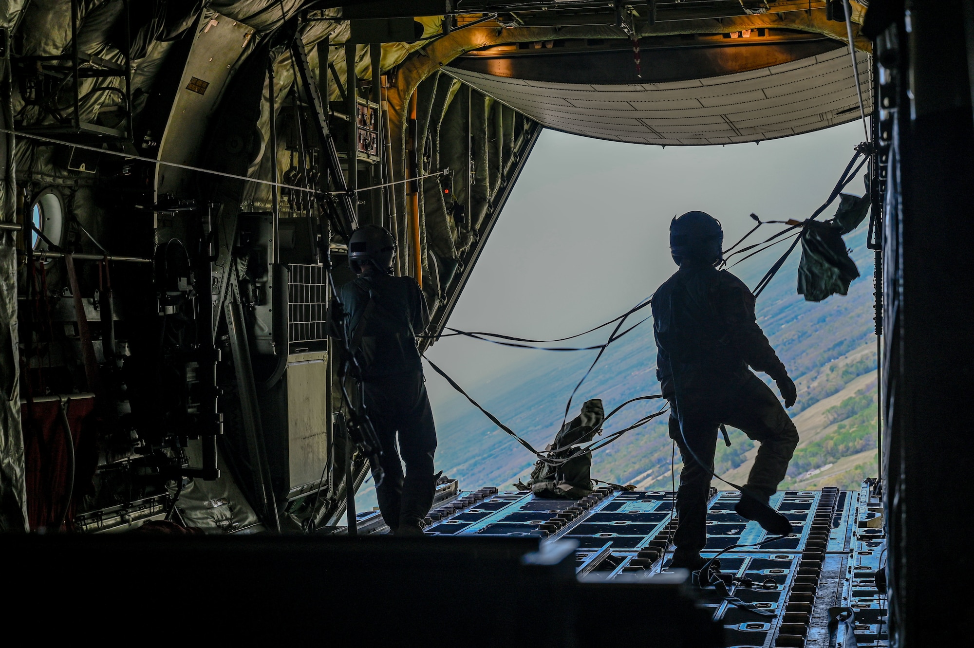 Team Little Rock Airmen drop cargo during the C-130J Super Hercules Weapons System Council formation flight at Little Rock Air Force Base, Arkansas, April 11, 2025. The exercise challenged crews to plan and execute missions under simulated contested conditions, encouraging the development of mission-ready Airmen trained to fly, fix, and support in combat.