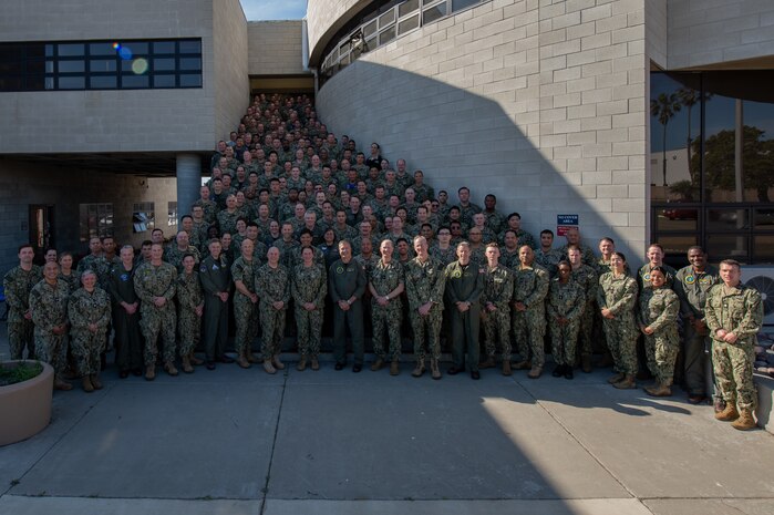 Sailors participating in Exercise MAKO Global 2025 pose for a group photo onboard Naval Amphibious Base Coronado, April 10.