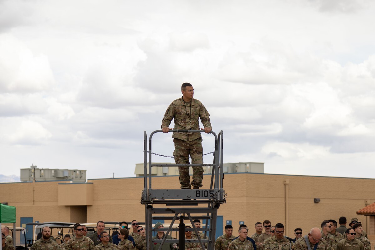 U.S. Air National Guard Master Sgt. Andres Garcia, 162nd Wing Weapons Standardization Superintendent oversees the 2025 Weapons Load Competition at Morris Air National Guard Base, Ariz., Apr.4, 2025. Load Crews were evaluated on their ability to safely and accurately load munitions onto F-16s under strict time constraints, compliance with safety protocols, and technical accuracy. (U.S. Air National Guard photo by Tech. Sgt. Stephen Luke)
