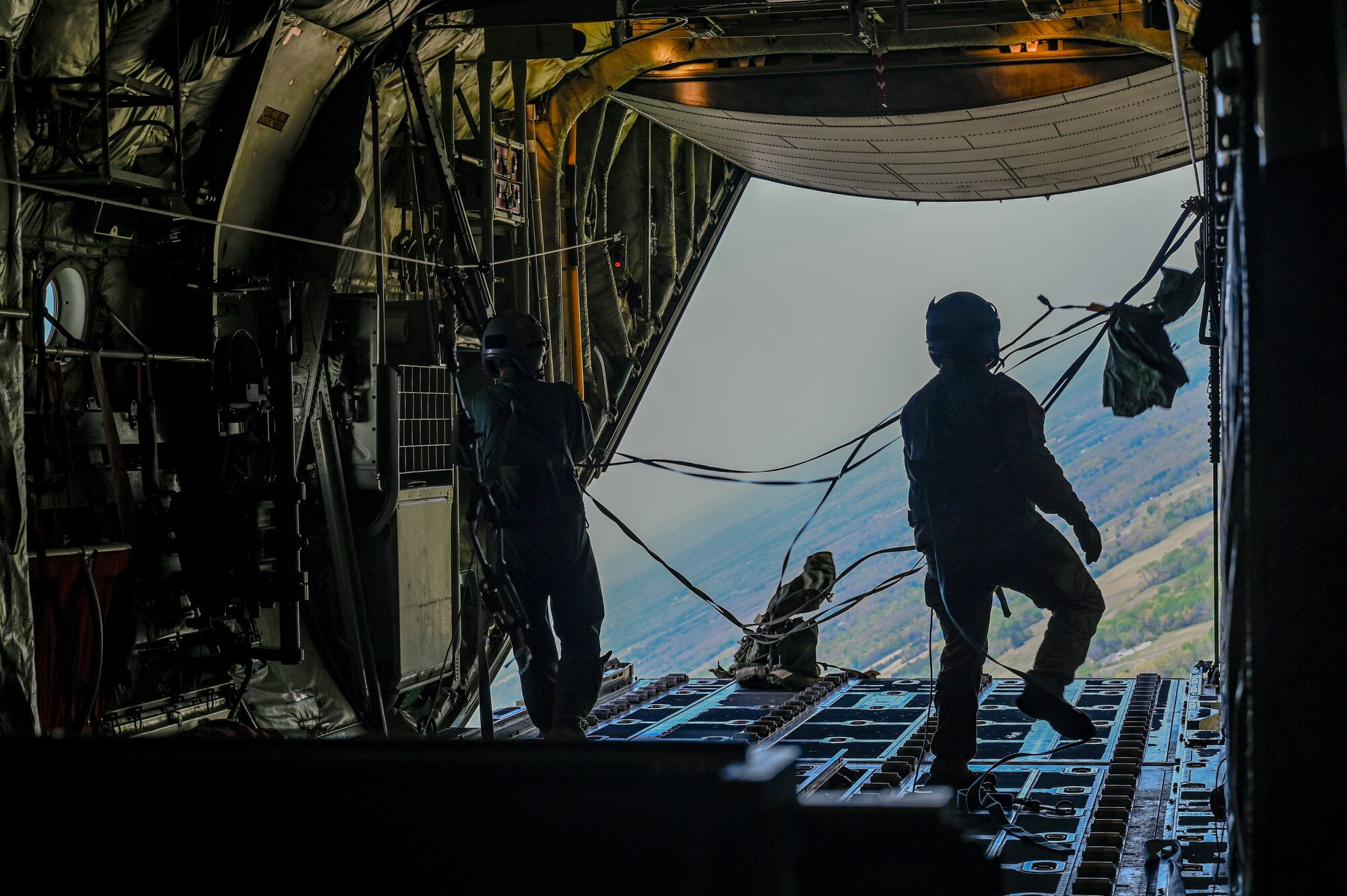 Team Little Rock Airmen drop cargo during the C-130J Super Hercules Weapons System Council formation flight at Little Rock Air Force Base, Arkansas, April 11, 2025. The exercise challenged crews to plan and execute missions under simulated contested conditions, encouraging the development of mission-ready Airmen trained to fly, fix, and support in combat.