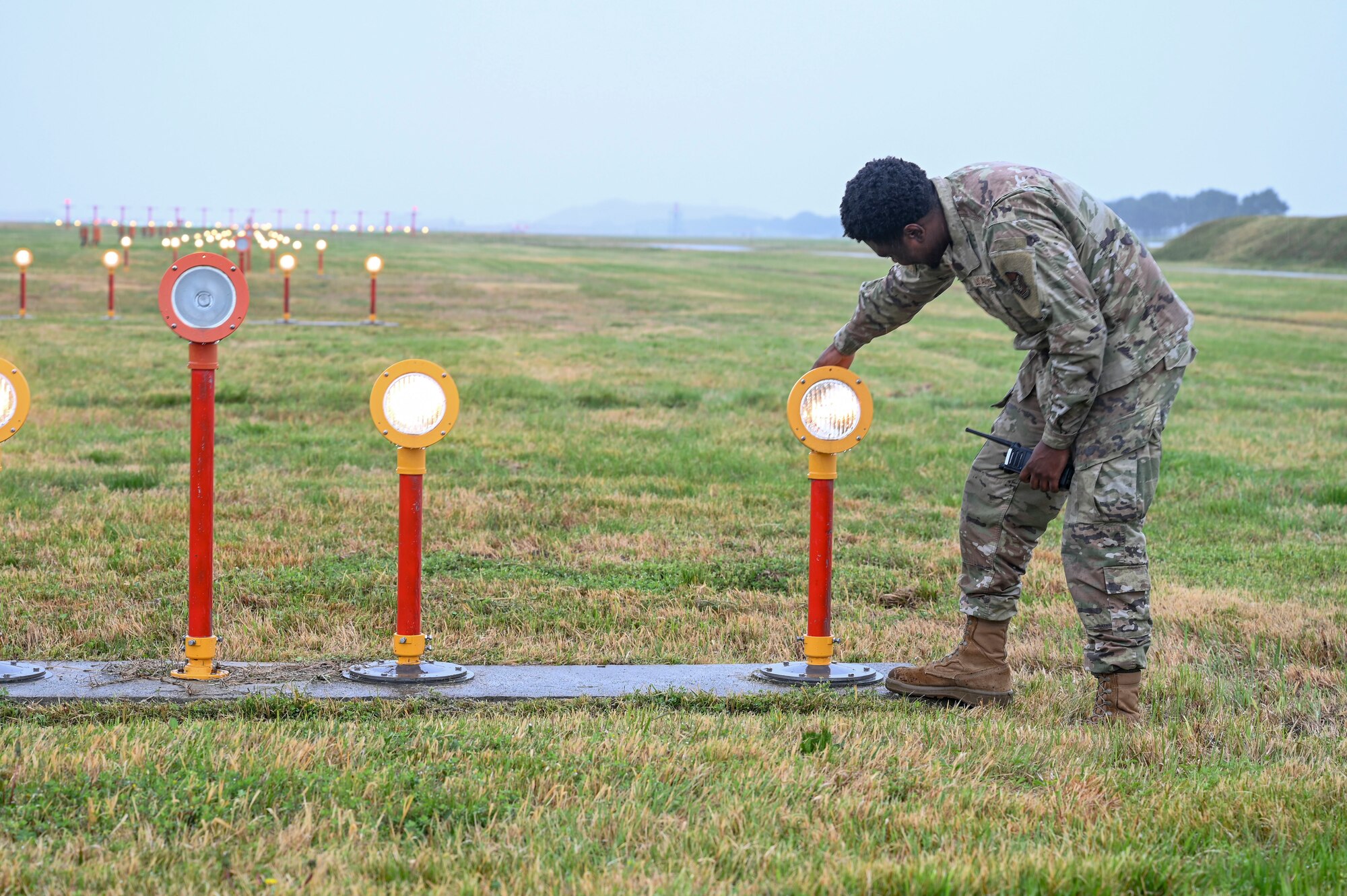 Senior Airman Morisse Daniels, 8th Operations Support Squadron airfield management operations supervisor, performs an approach lighting check during Freedom Flag 25-1 at Kunsan Air Base, Republic of Korea, April 22, 2025.